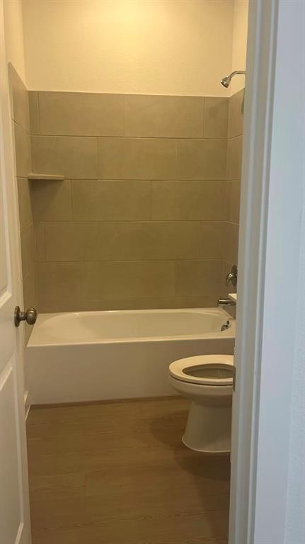 909 Calley Pear Trail Princeton, TX 75407 - Photo 5 of 17 a bathroom with a shower and a toilet