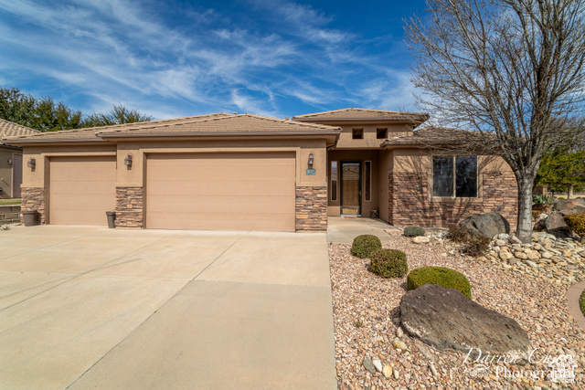 View of front of house with a 3-car garage