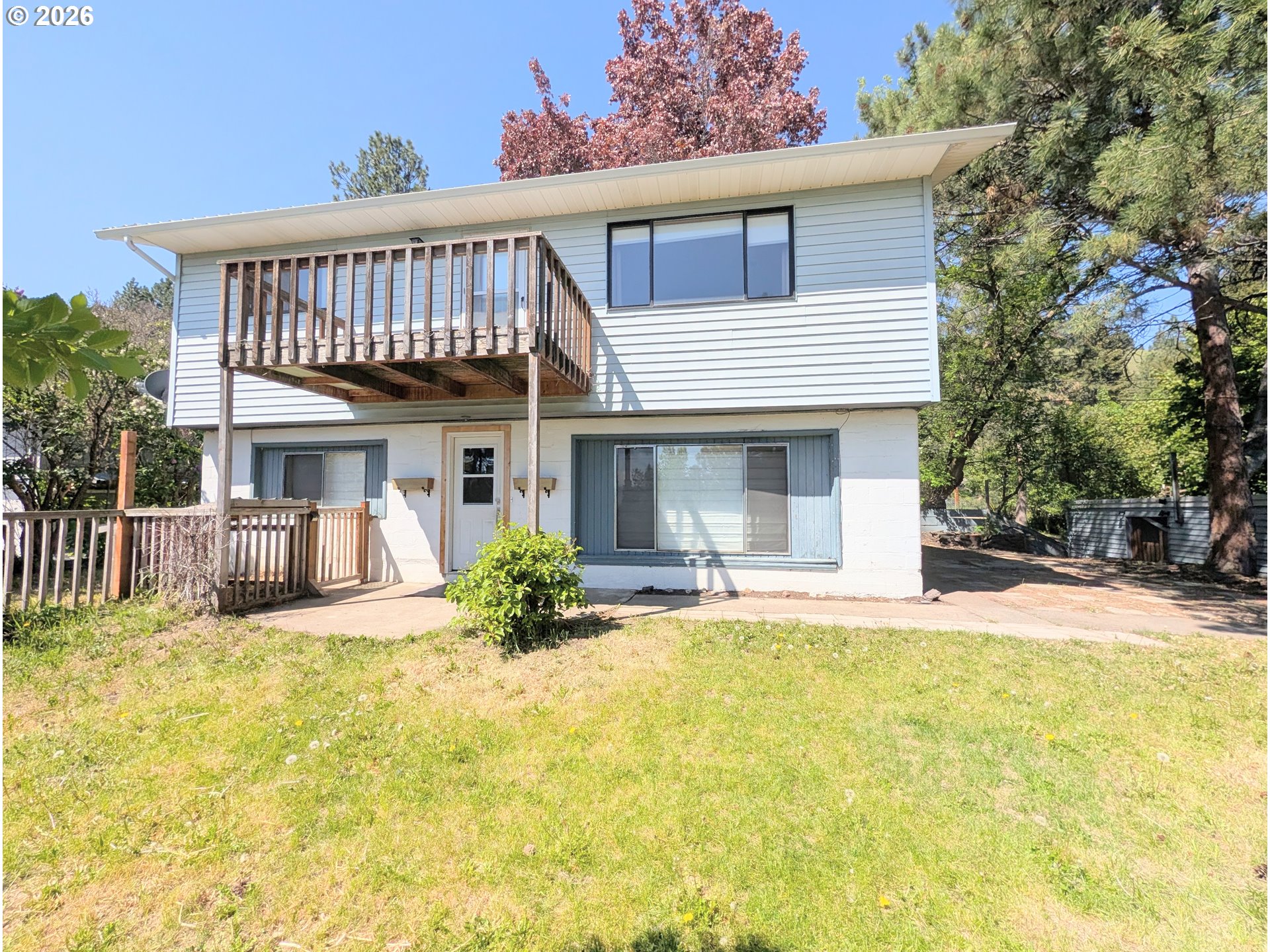 1624 Foley Street La Grande, OR 97850 - Photo 1 of 37 a front view of a house with a garden and porch