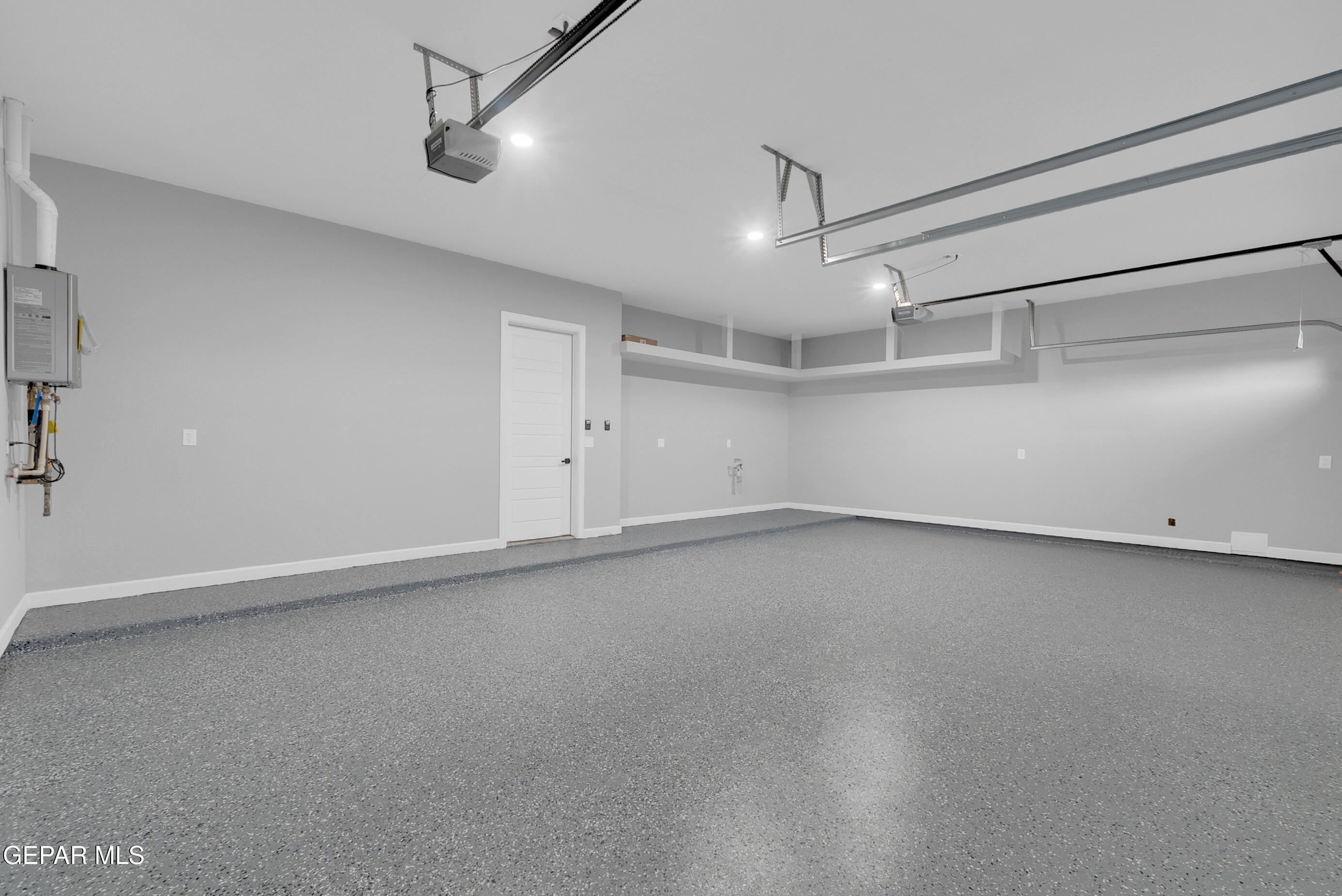 5612 Rio Bonito Circle El Paso, TX 79932 - Photo 65 of 79 an empty room with a empty space and windows