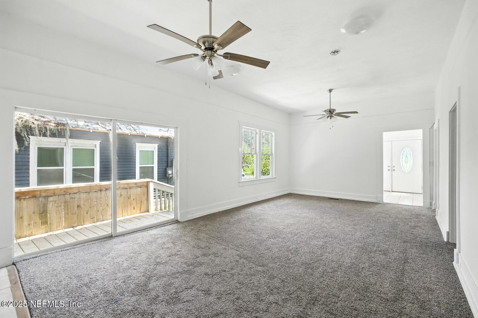 412 Madison Street Palatka, FL 32177 - Photo 11 of 29 a view of an empty room with a window