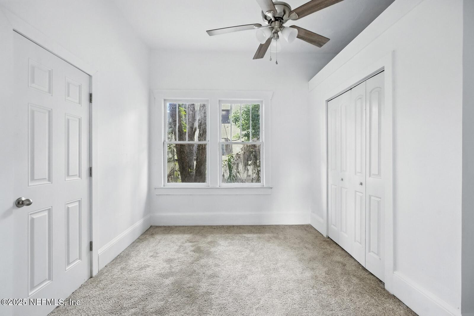 412 Madison Street Palatka, FL 32177 - Photo 18 of 29 a view of an empty room with a window