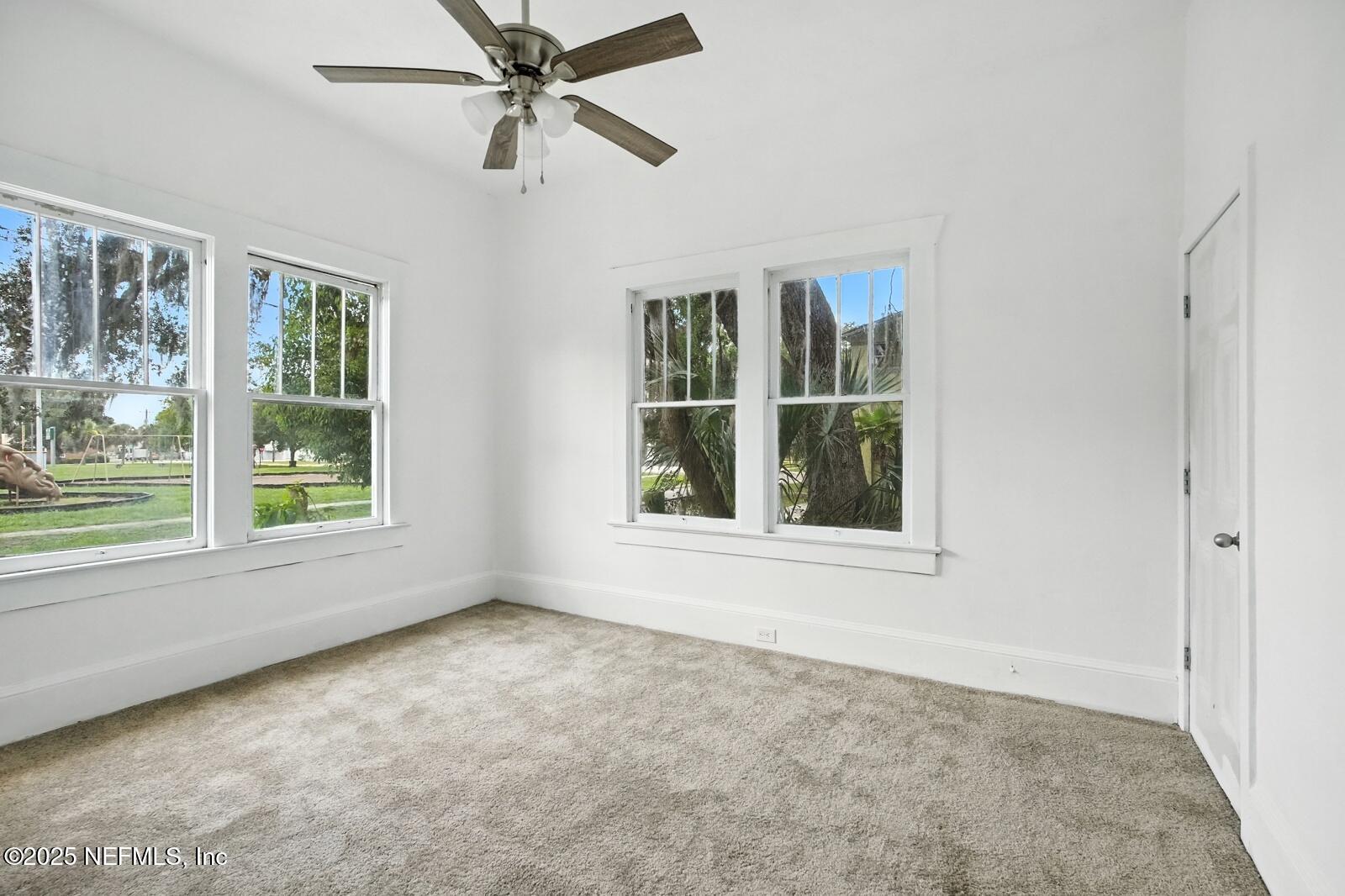412 Madison Street Palatka, FL 32177 - Photo 19 of 29 an empty room with windows