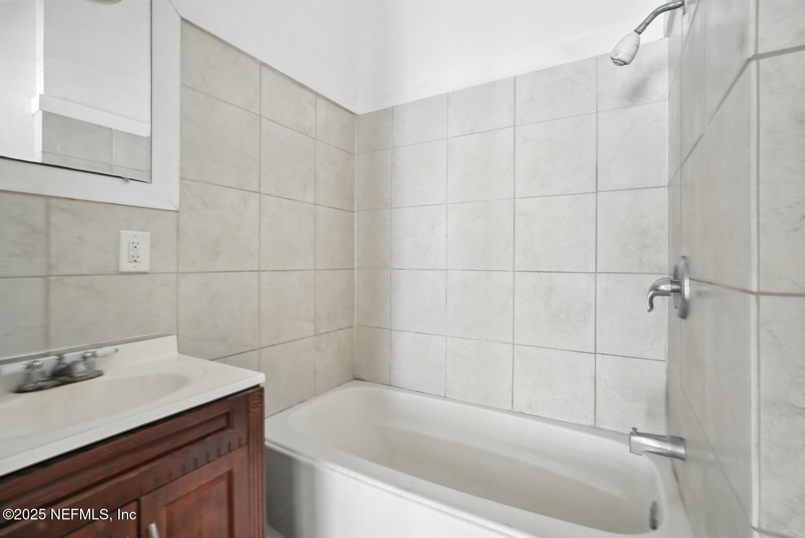 412 Madison Street Palatka, FL 32177 - Photo 21 of 29 a bathroom with a sink and shower