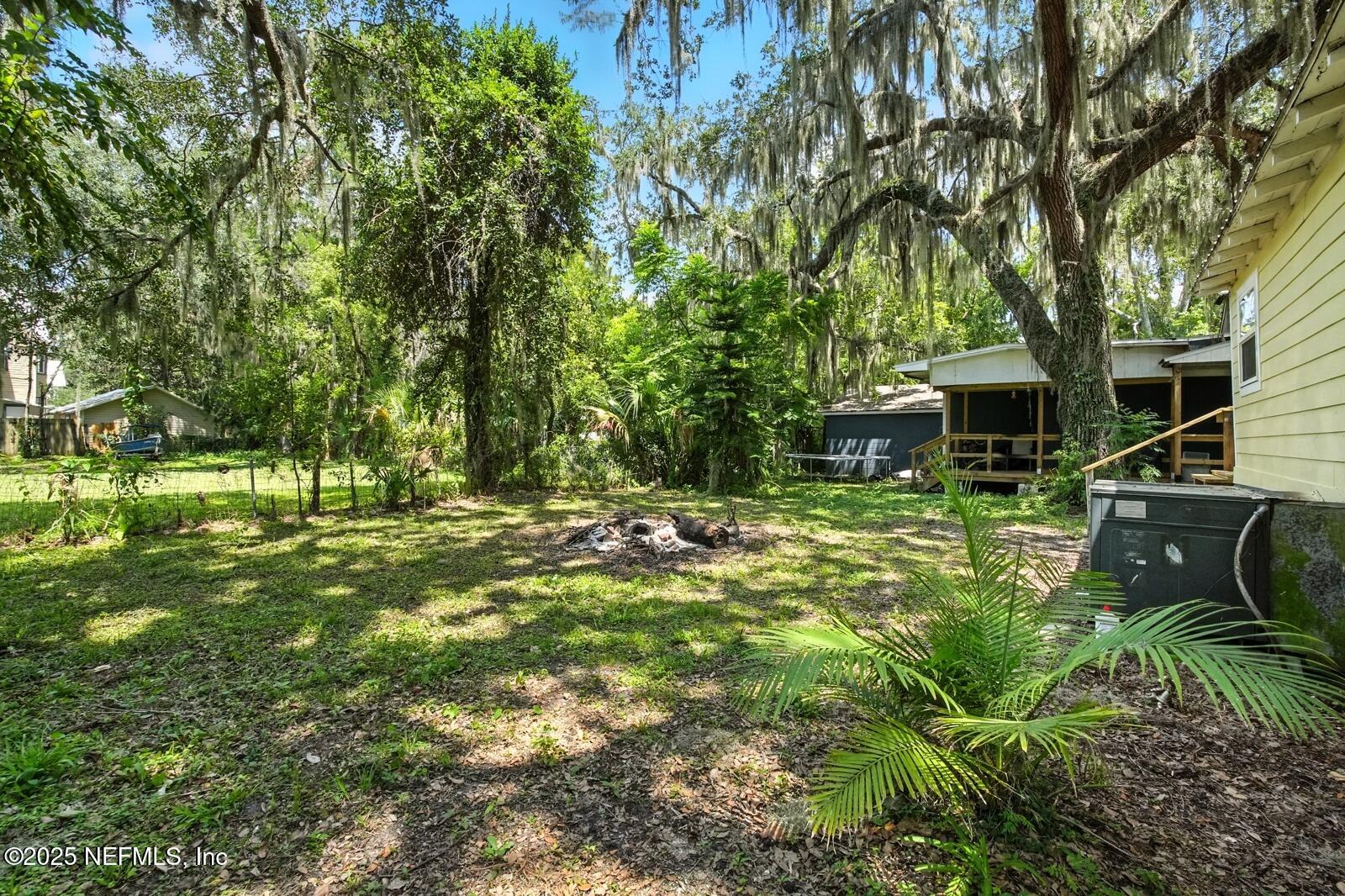 412 Madison Street Palatka, FL 32177 - Photo 26 of 29 a front view of a house with a yard