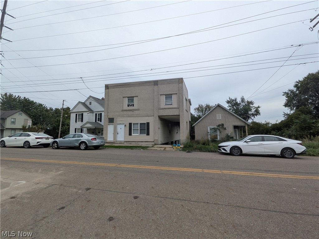 1881 Manchester Road, Unit 1 Akron, OH 44314 - Photo 37 of 44 1881 Manchester Rd, Akron, OH 44314 Unit #1 ground floor access and living. Welcome to this spacious 2-bedroom, 1-bathroom first-floor generous and remodeled apartment in the Kenmore neighborhood of Akron, offering a great amount of comfortable living space. This move-in ready apartment features LVP flooring throughout, a spacious living room, room for dining, separate kitchen with a gas range and stainless steel refrigerator, two bedrooms, and a full private bathroom which has a convenient step-in shower. Large windows provide natural light, while ample closets offer plenty of storage. Enjoy off-street parking and a backyard with a picnic table and small firepit, providing a pleasant outdoor space to relax and enjoy for the buildings tenants.