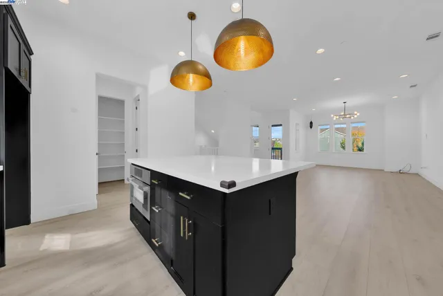 a kitchen with a cabinets and counter space
