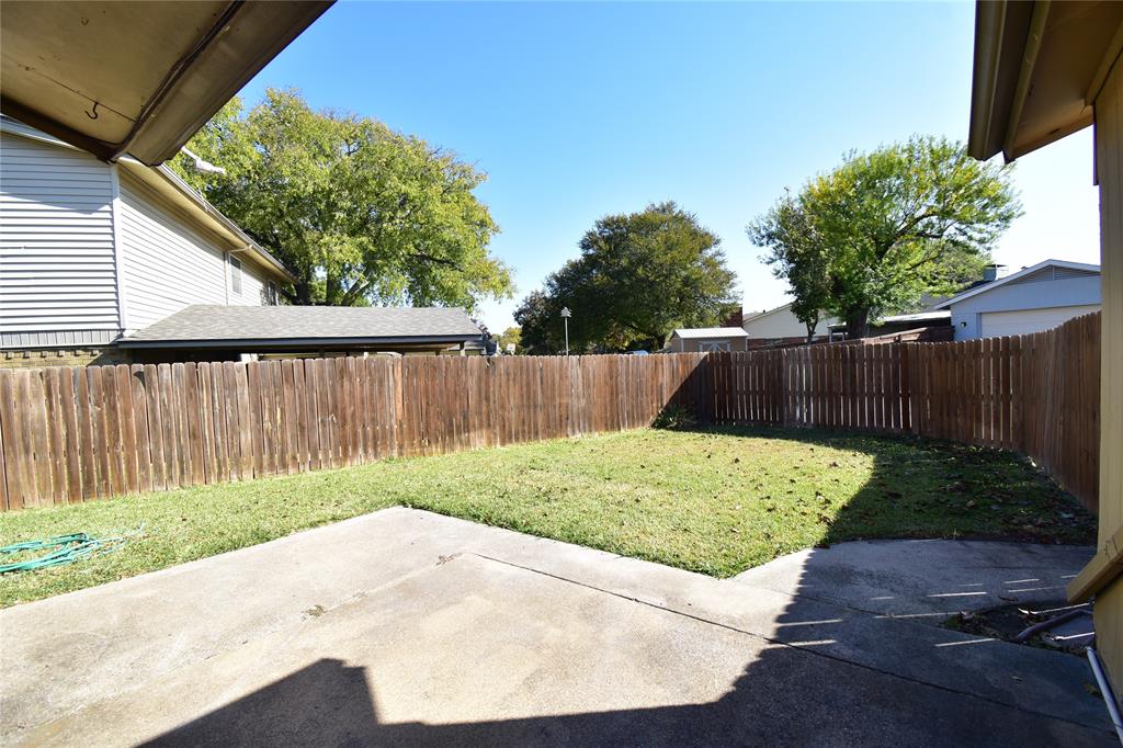 5414 Castleview Lane Garland, TX 75044 - Photo 19 of 20 Fenced backyard featuring a patio area