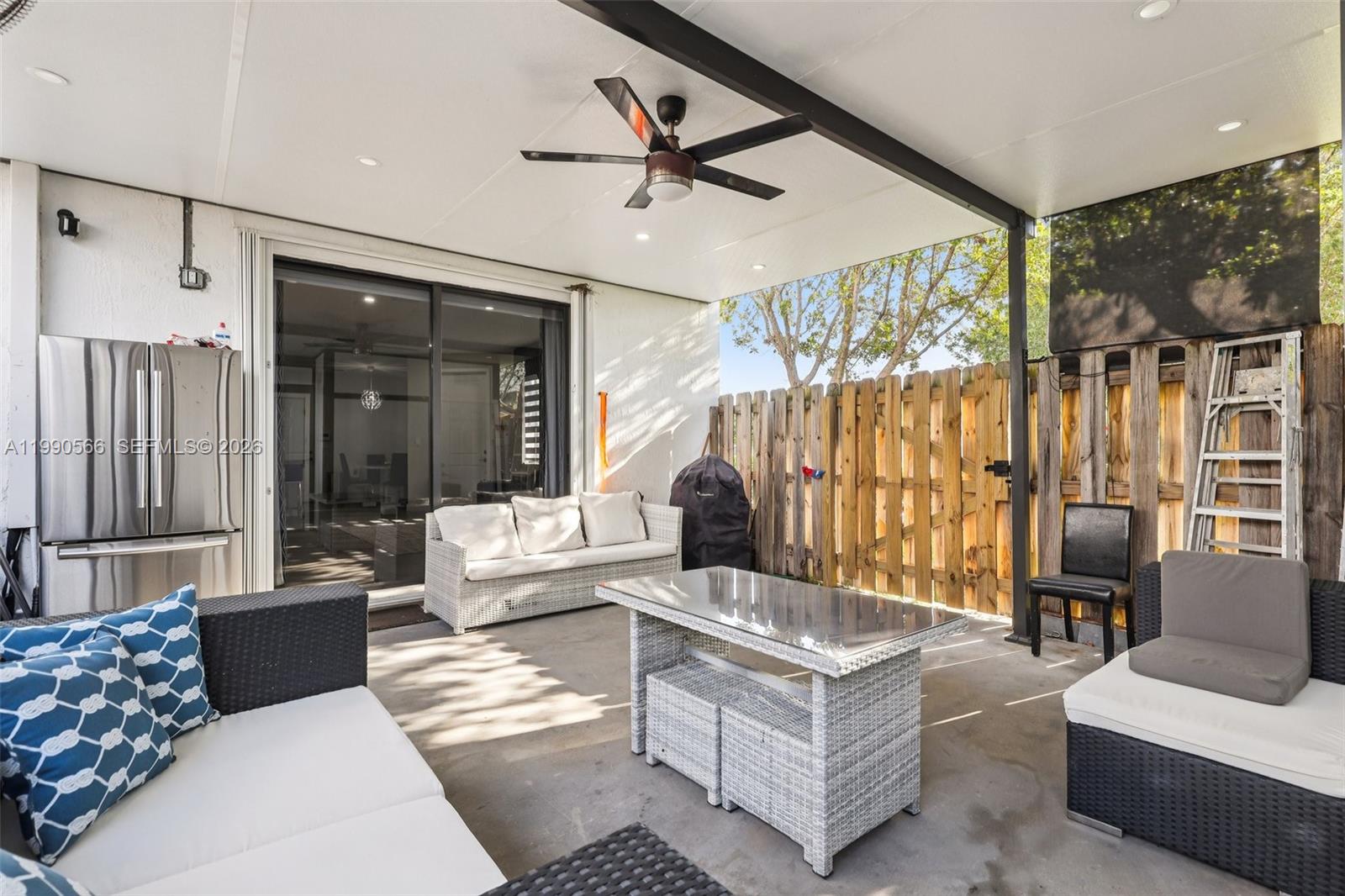 10828 Southwest 235th Street Homestead, FL 33032 - Photo 27 of 38 Covered Rear Patio with Privacy fence