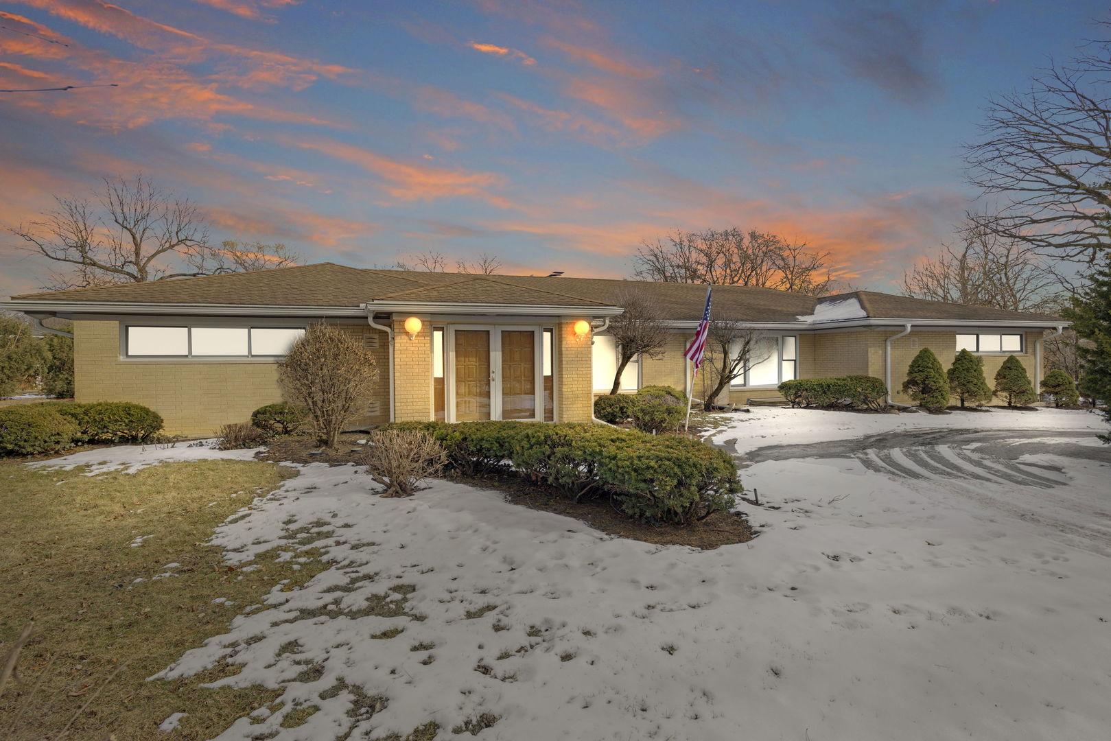 41 Windsor Drive Oak Brook, IL 60523 - Photo 1 of 1 a front view of a house with a yard