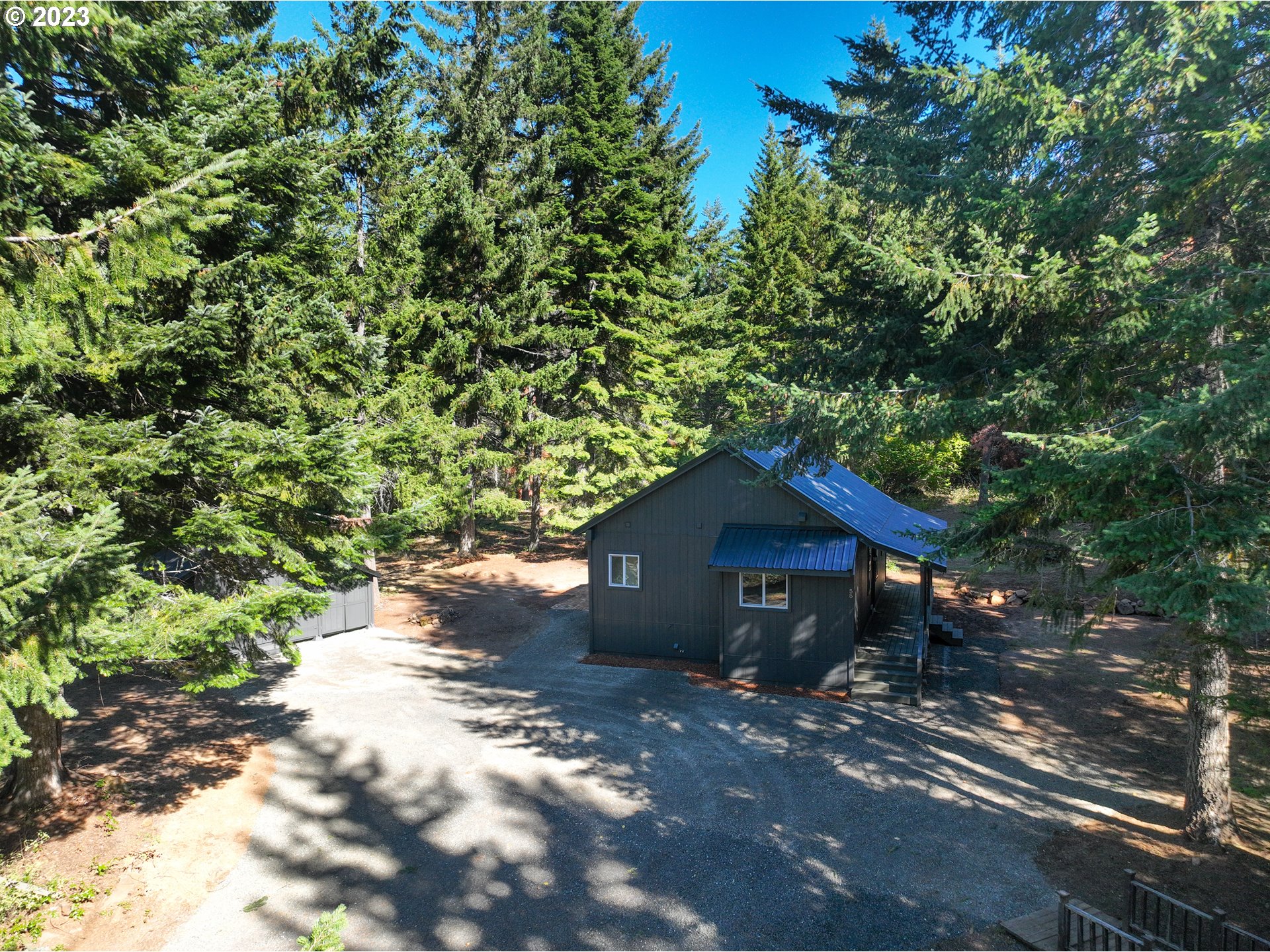 55 Moonshine Road Appleton, WA 98602 - Photo 2 of 33 a view of a house with a yard