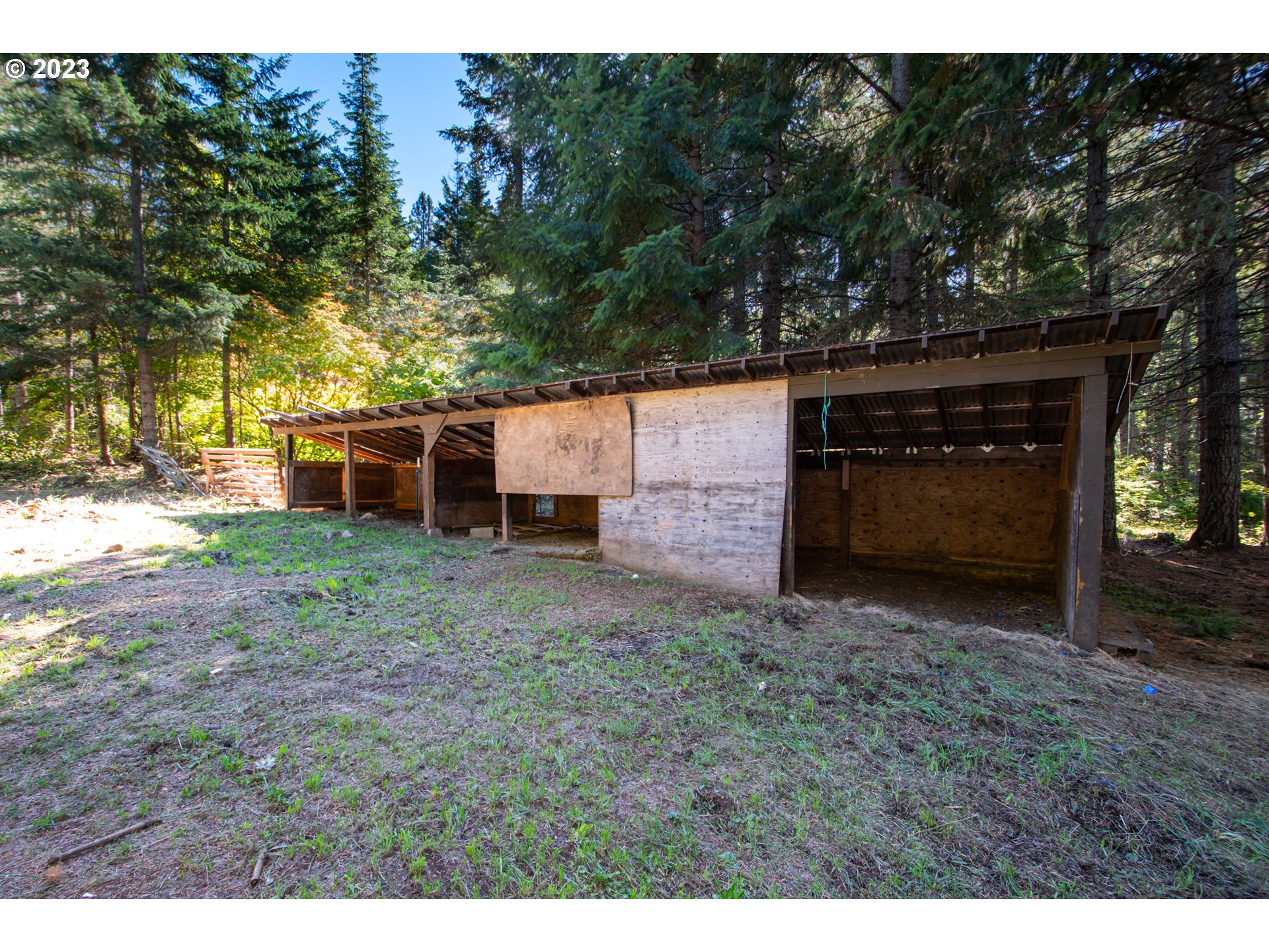 55 Moonshine Road Appleton, WA 98602 - Photo 21 of 33 a view of a house with a yard