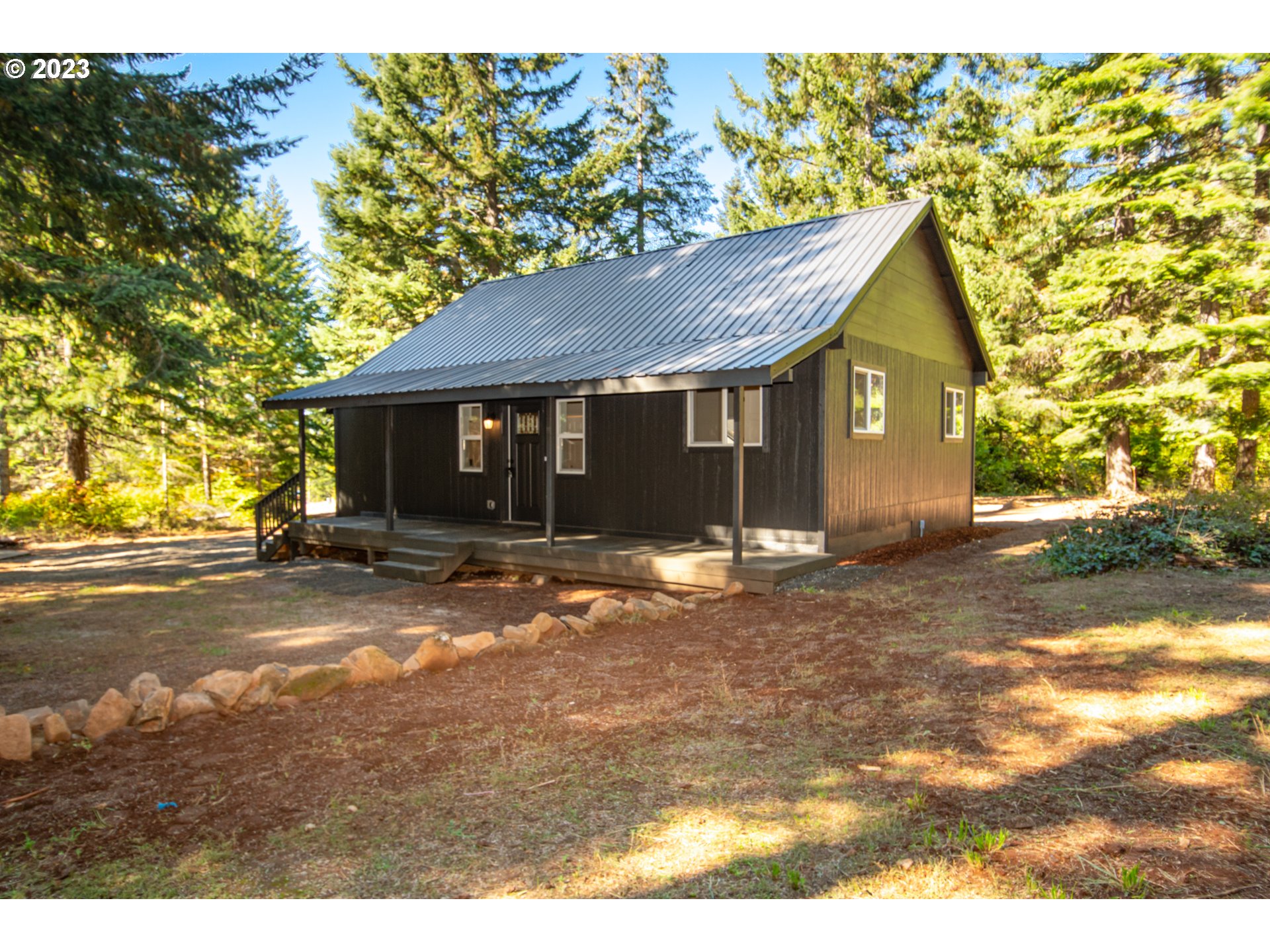 55 Moonshine Road Appleton, WA 98602 - Photo 27 of 33 a view of a house with a yard