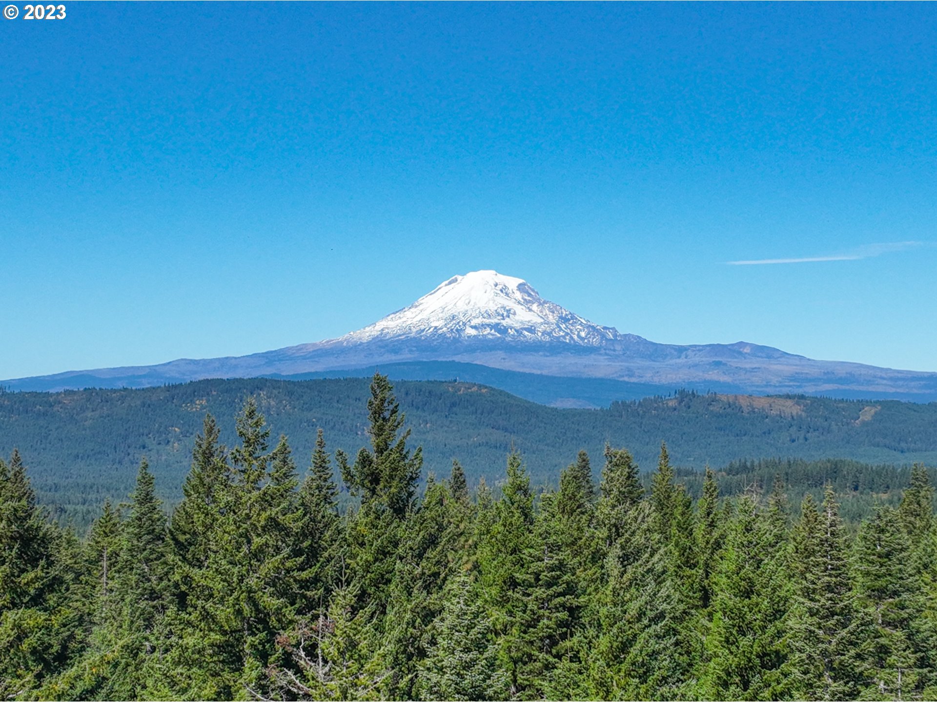 55 Moonshine Road Appleton, WA 98602 - Photo 28 of 33 a view of a lake with a mountain in the background