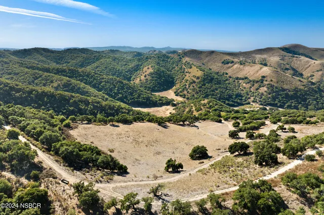 a view of a swimming pool with a chair