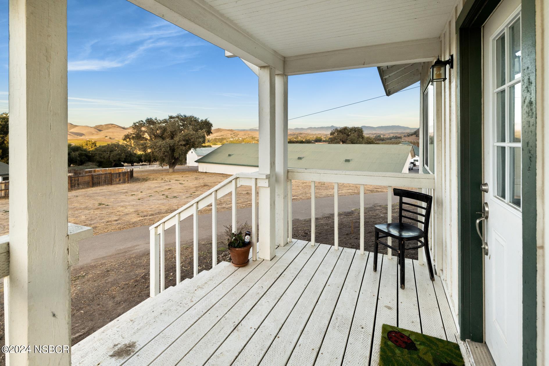 0 Ca Highway Los Alamos, CA 93440 - Photo 45 of 76 a view of balcony with floor to ceiling windows and wooden floor