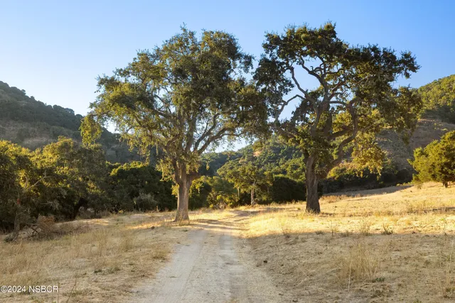 a view of ocean with mountains