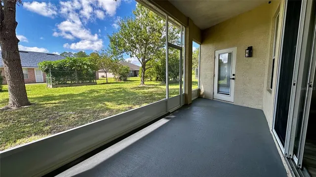 a view of a porch with a yard