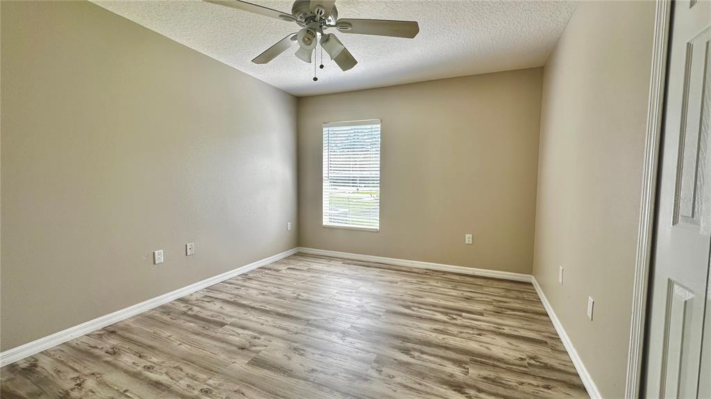 60 Pine Grove Drive Palm Coast, FL 32164 - Photo 4 of 20 a view of an empty room with a window