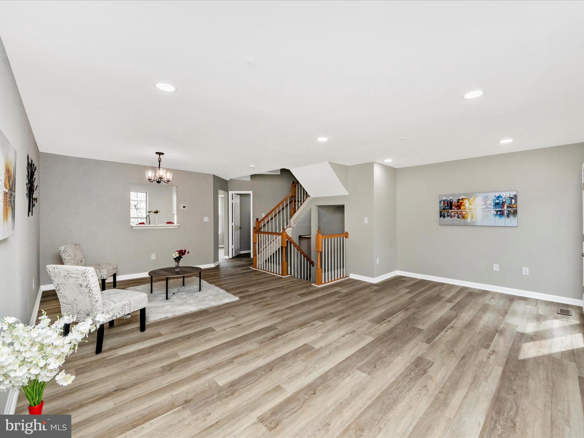 2242 Commissary Circle Odenton, MD 21113 - Photo 13 of 51 a view of a livingroom with furniture and wooden floor