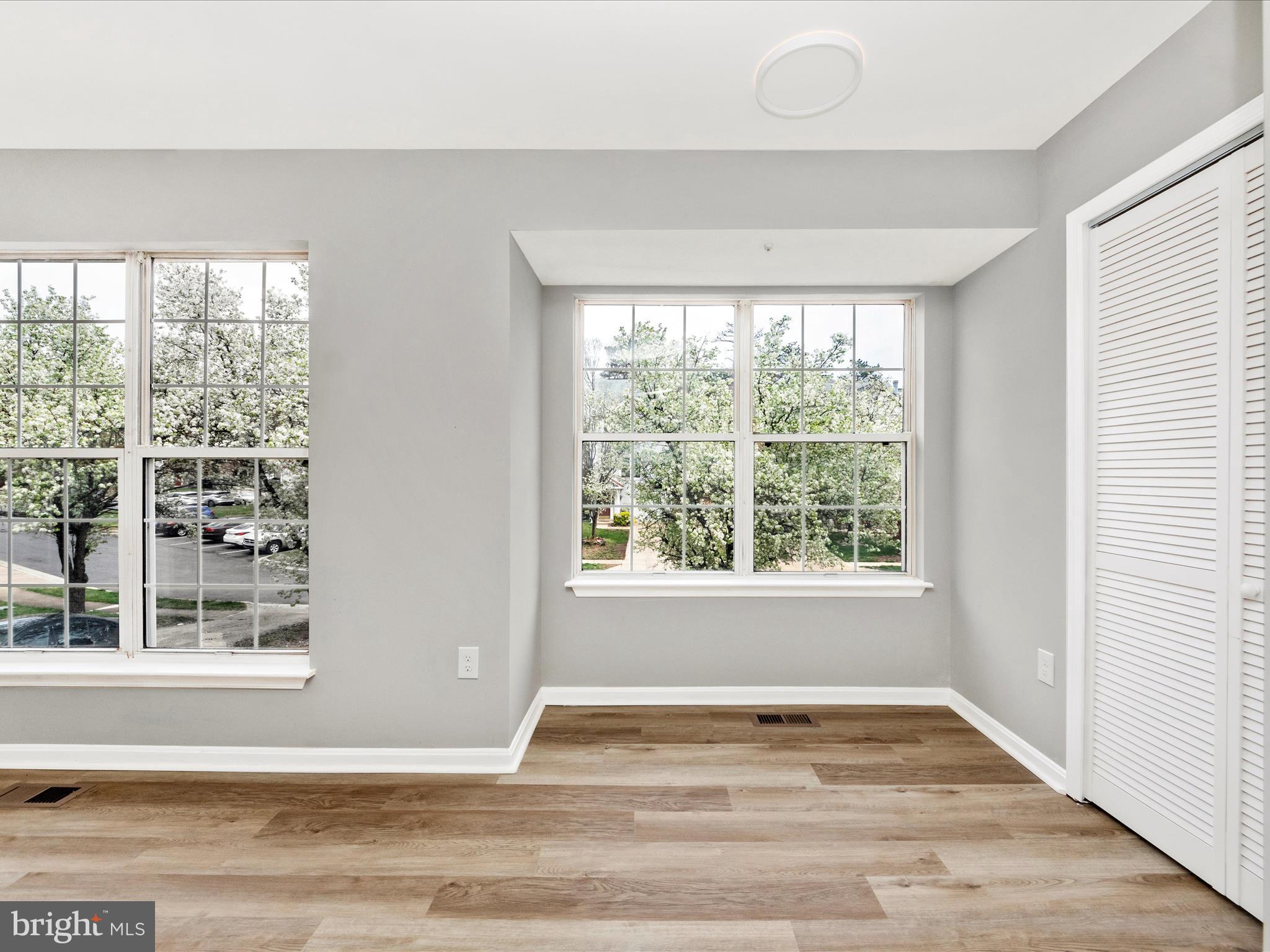 2242 Commissary Circle Odenton, MD 21113 - Photo 17 of 51 a view of a livingroom with wooden floor and a window
