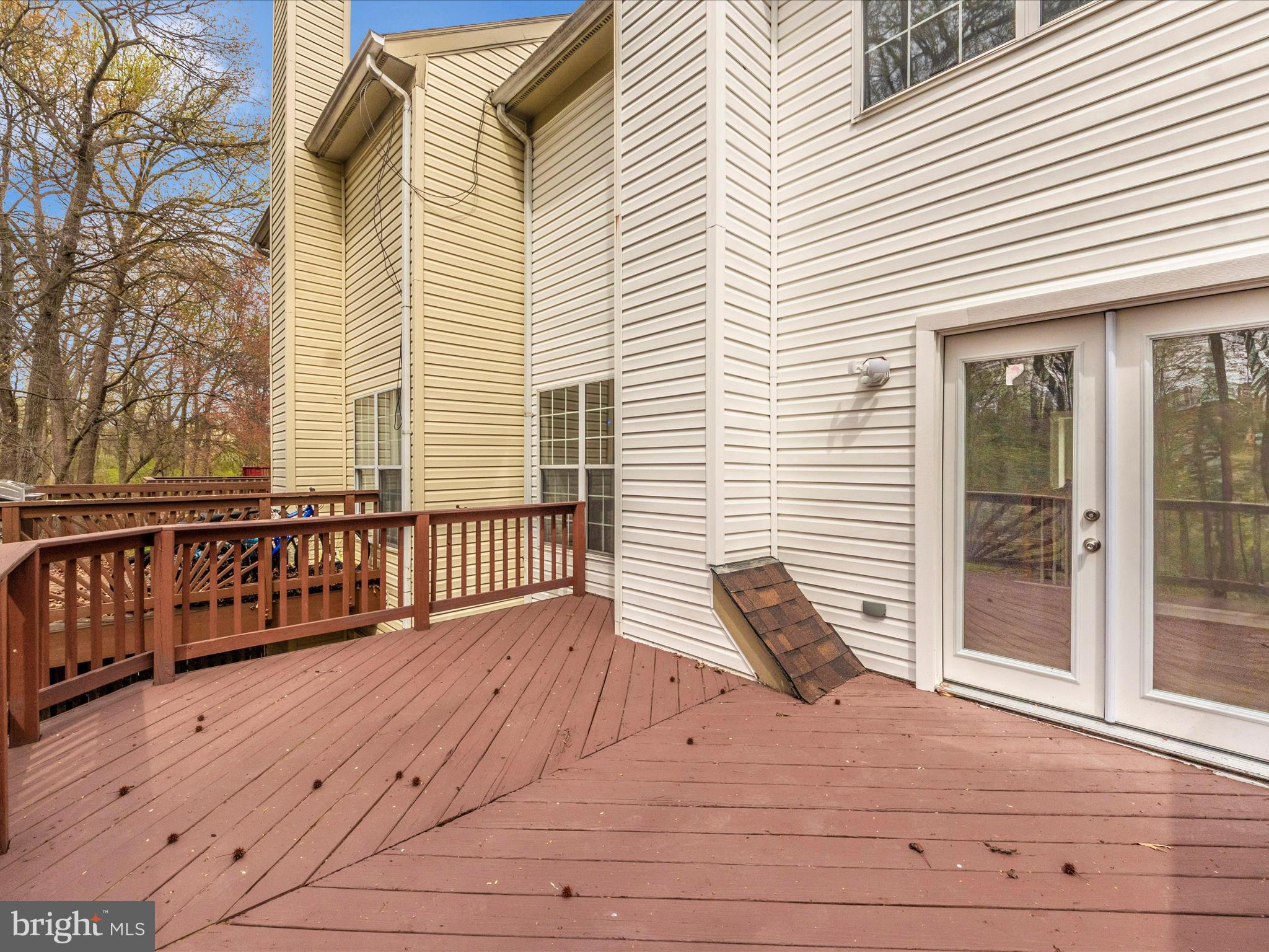 2242 Commissary Circle Odenton, MD 21113 - Photo 40 of 51 a view of a wooden deck with a large window