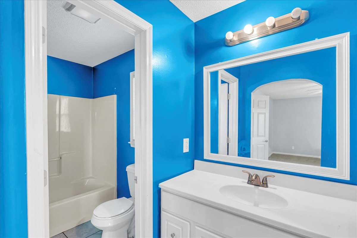 179 Eaton Heights Manchester, TN 37355 - Photo 16 of 33 a bathroom with a sink a toilet and shower