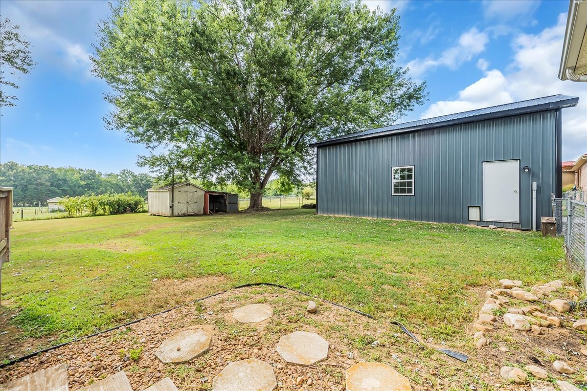 179 Eaton Heights Manchester, TN 37355 - Photo 24 of 33 a view of a backyard with large trees