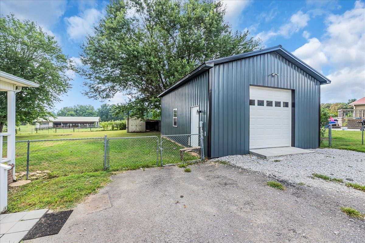 179 Eaton Heights Manchester, TN 37355 - Photo 25 of 33 a view of a house with a yard