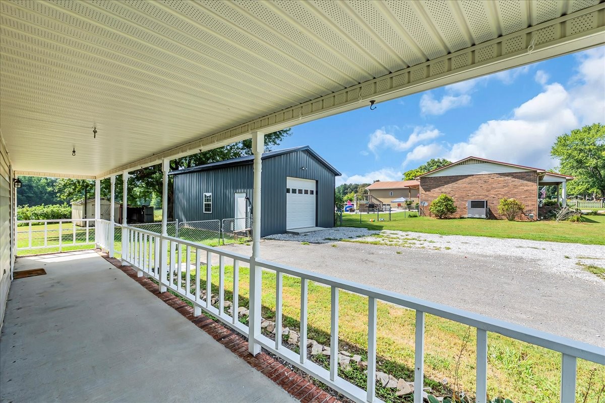 179 Eaton Heights Manchester, TN 37355 - Photo 32 of 33 a view of a house with a porch