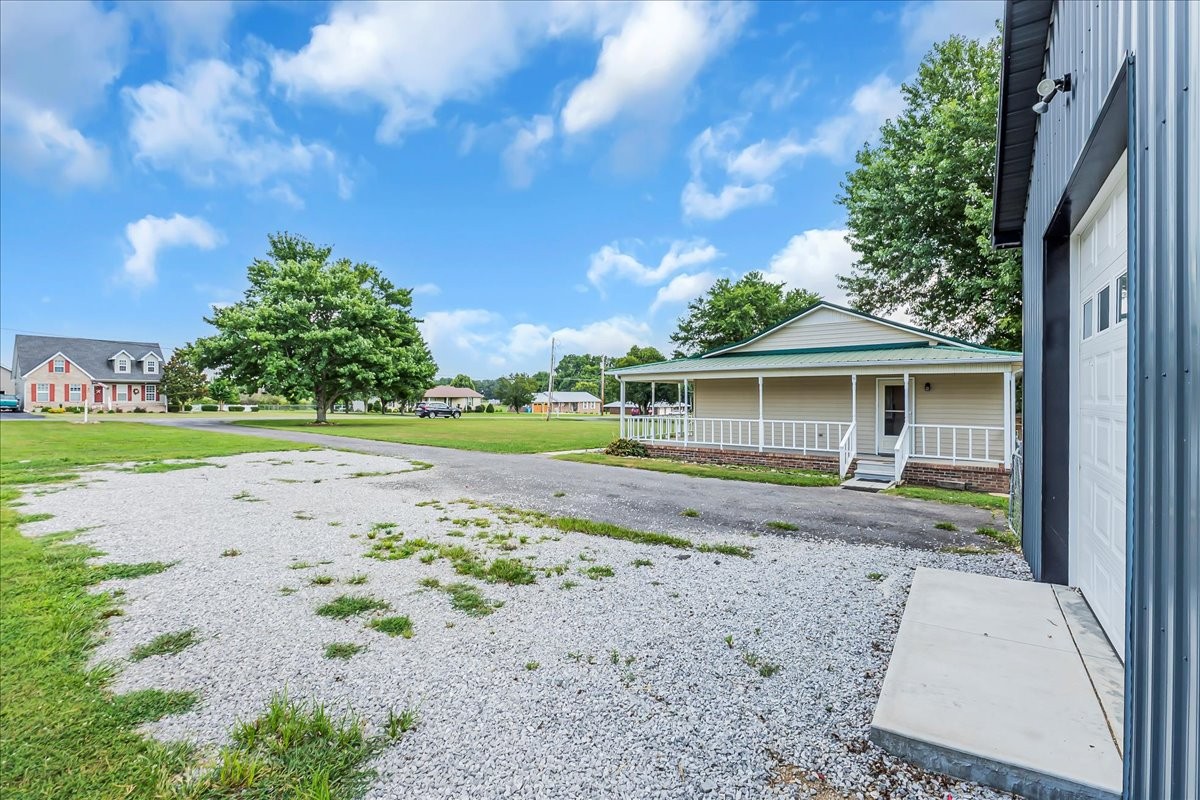 179 Eaton Heights Manchester, TN 37355 - Photo 33 of 33 front view of a house with a yard