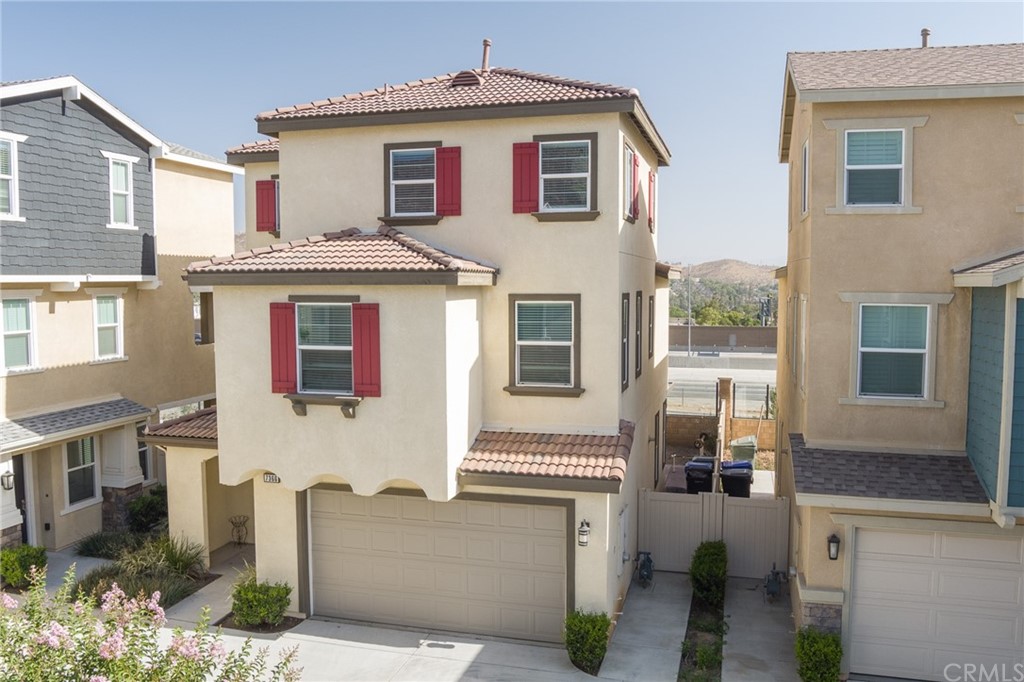7366 Rocky Point Road Jurupa Valley, CA 92509 - Photo 1 of 1 a front view of a house with a porch