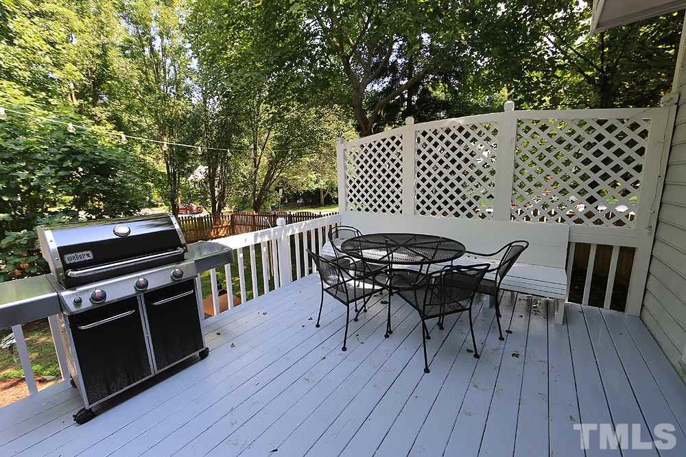 4120 Mardella Drive Raleigh, NC 27613 - Photo 15 of 20 Upper deck area overlooking private backyard