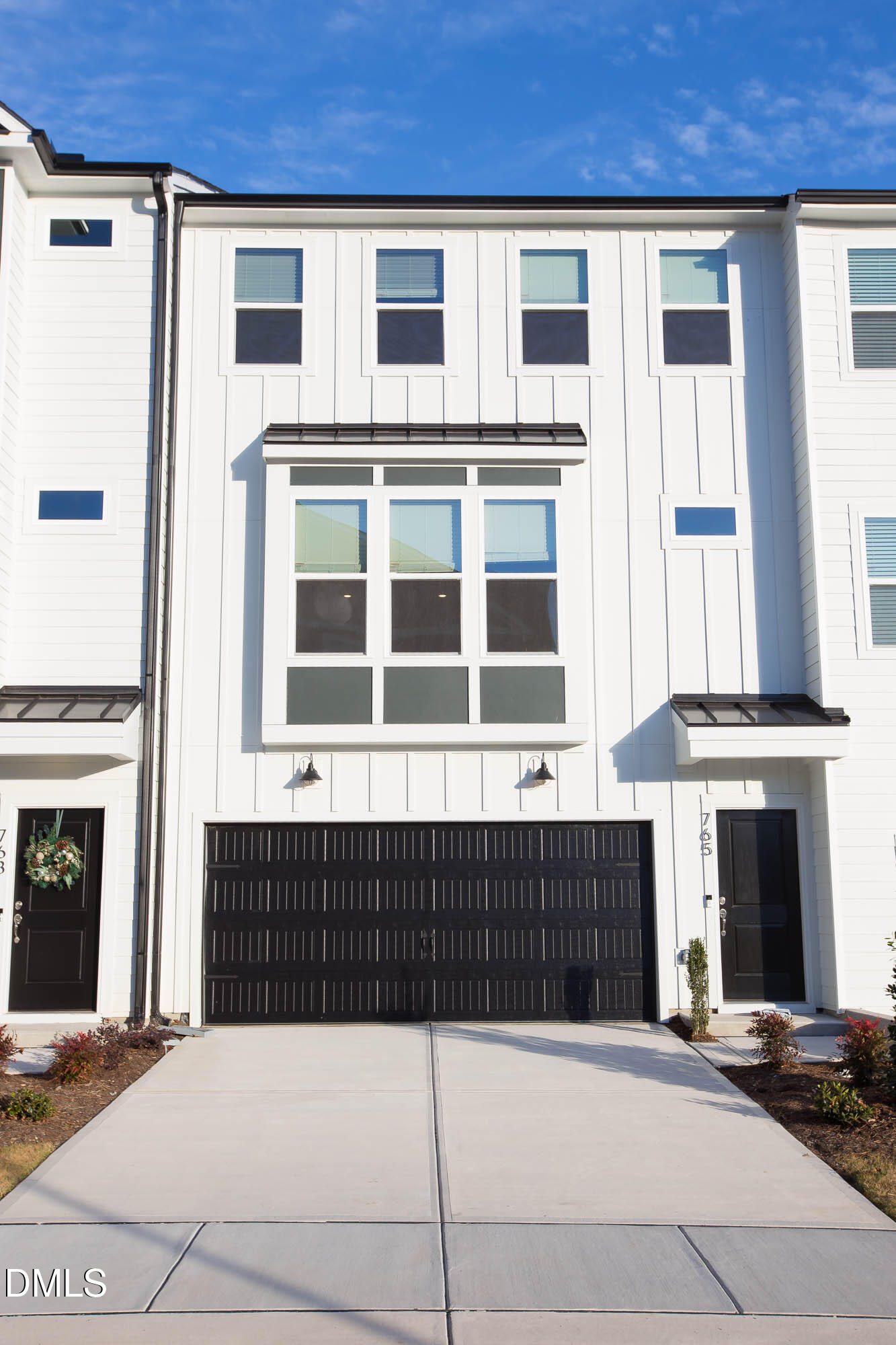 765 Larkspur Bowl Way Apex, NC 27523 - Photo 1 of 25 a bathroom with a tub and shower