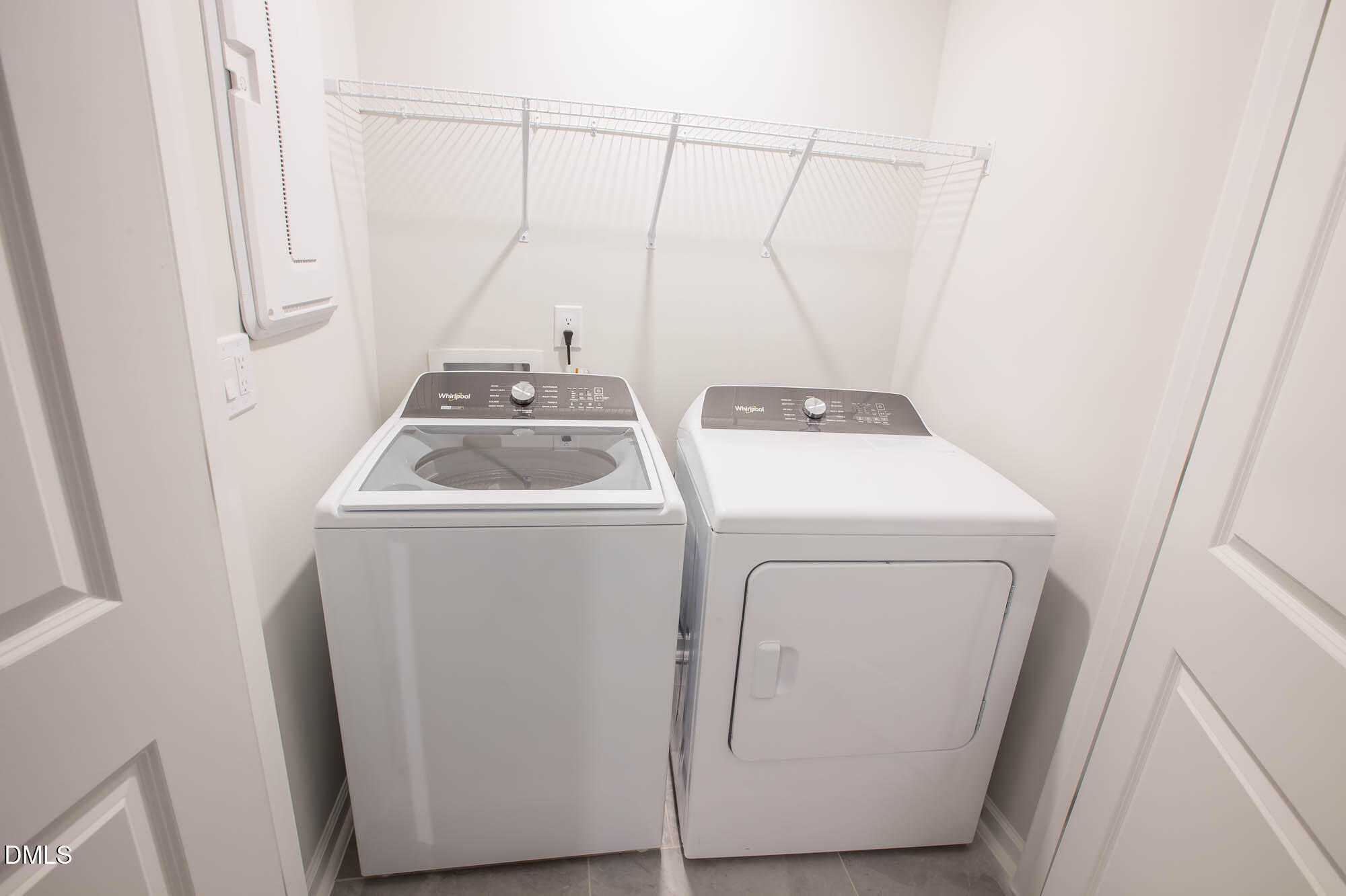 765 Larkspur Bowl Way Apex, NC 27523 - Photo 19 of 25 a utility room with dryer and washer