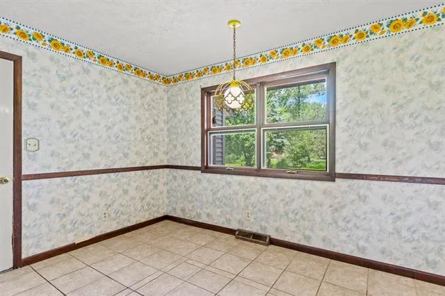 a bathroom with a sink a mirror and a shower