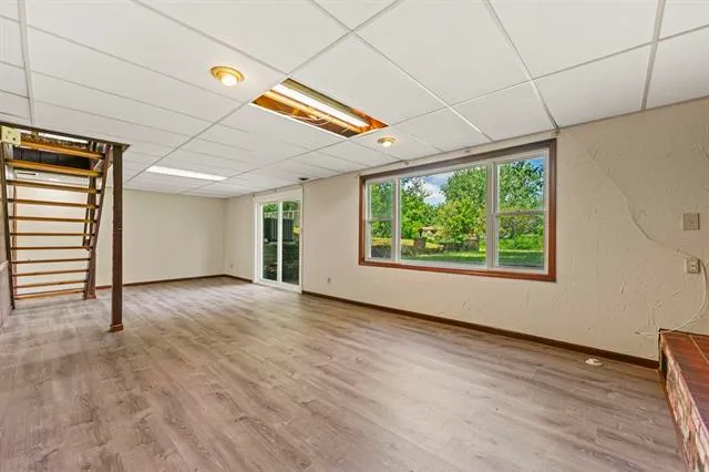 a utility room with cabinets dryer and washer