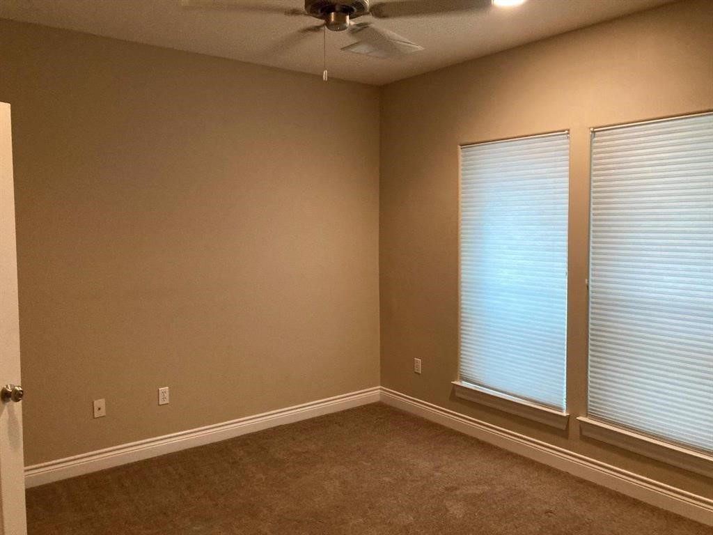 1623 Stuart Street Houston, TX 77004 - Photo 4 of 24 1st floor bedroom has an attached ensuite bath and closet