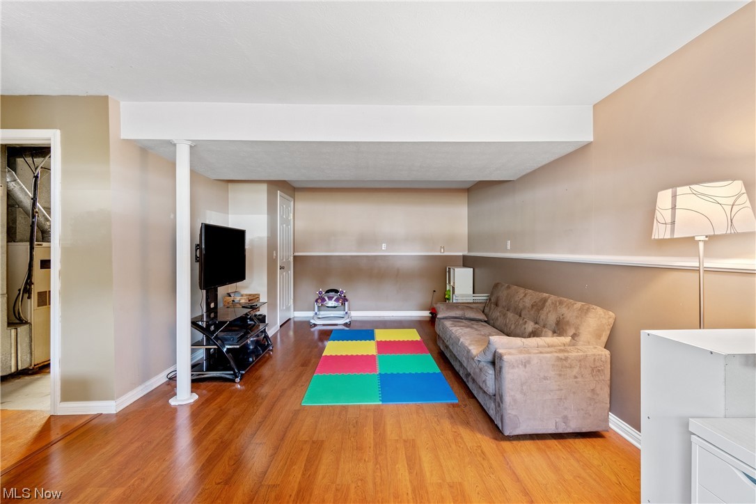 1547 Sunnyacres Road Akron, OH 44321 - Photo 17 of 23 Living room featuring light parquet floors