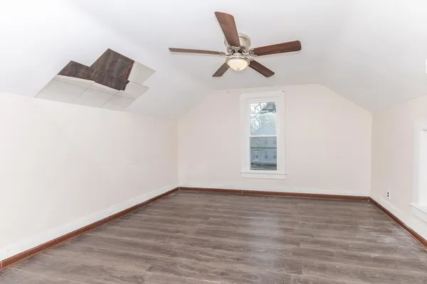 a view of room window and wooden floor