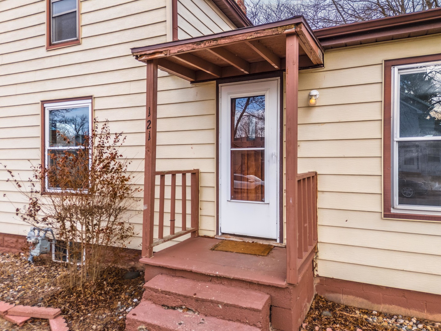 121 East James Street Forrest, IL 61741 - Photo 37 of 39 a view of a house with a door and wooden floor