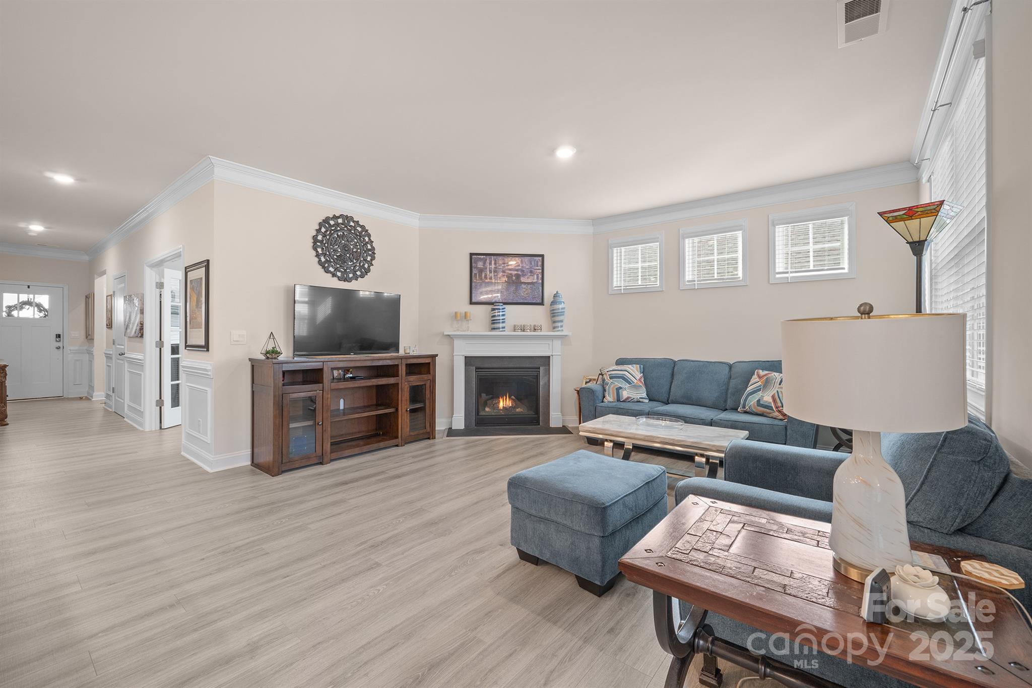 106 South Shayna Road Troutman, NC 28166 - Photo 11 of 41 a living room with furniture and a fireplace