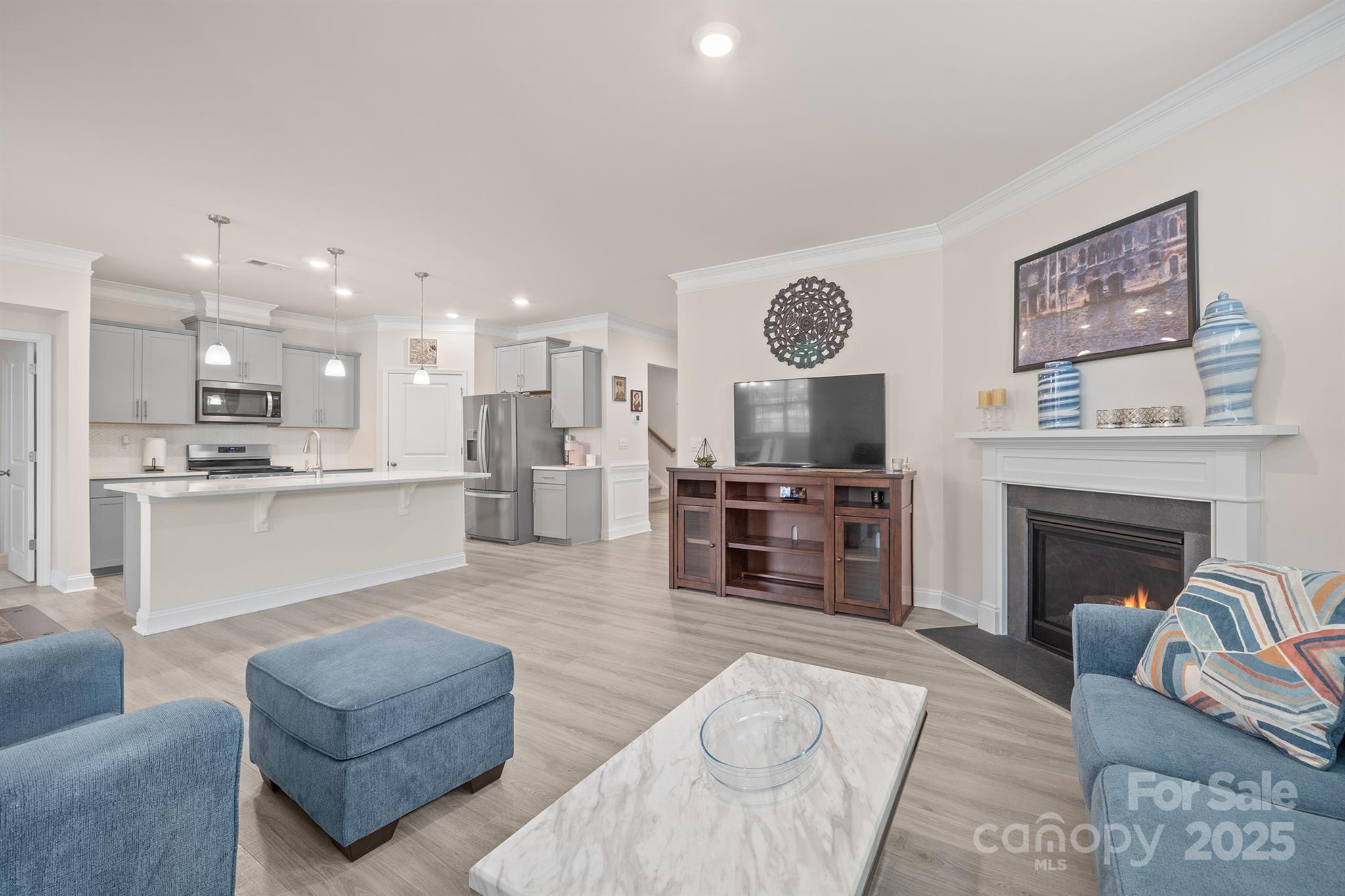 106 South Shayna Road Troutman, NC 28166 - Photo 13 of 41 a living room with furniture and a fireplace