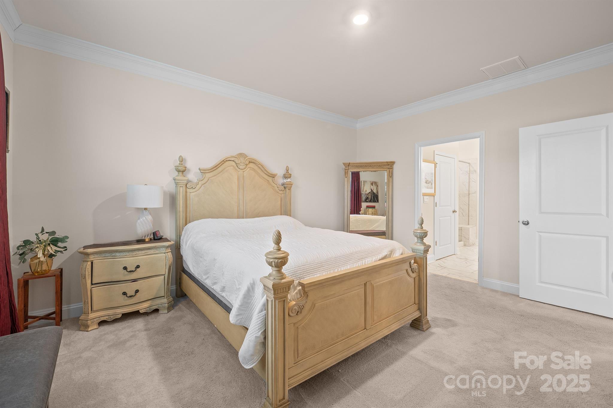 106 South Shayna Road Troutman, NC 28166 - Photo 19 of 41 a bedroom with a bed and a cabinets