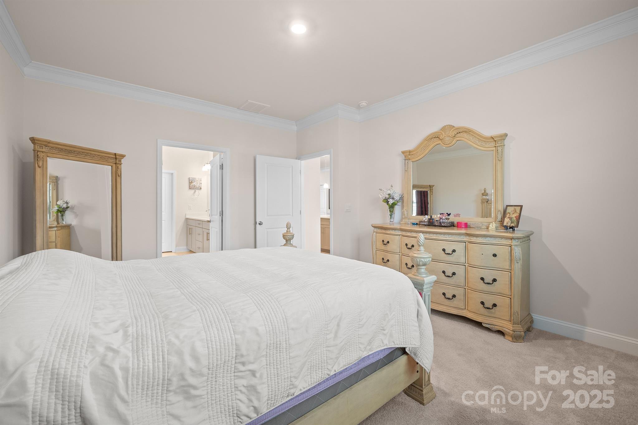 106 South Shayna Road Troutman, NC 28166 - Photo 20 of 41 a bedroom with a bed and a dresser