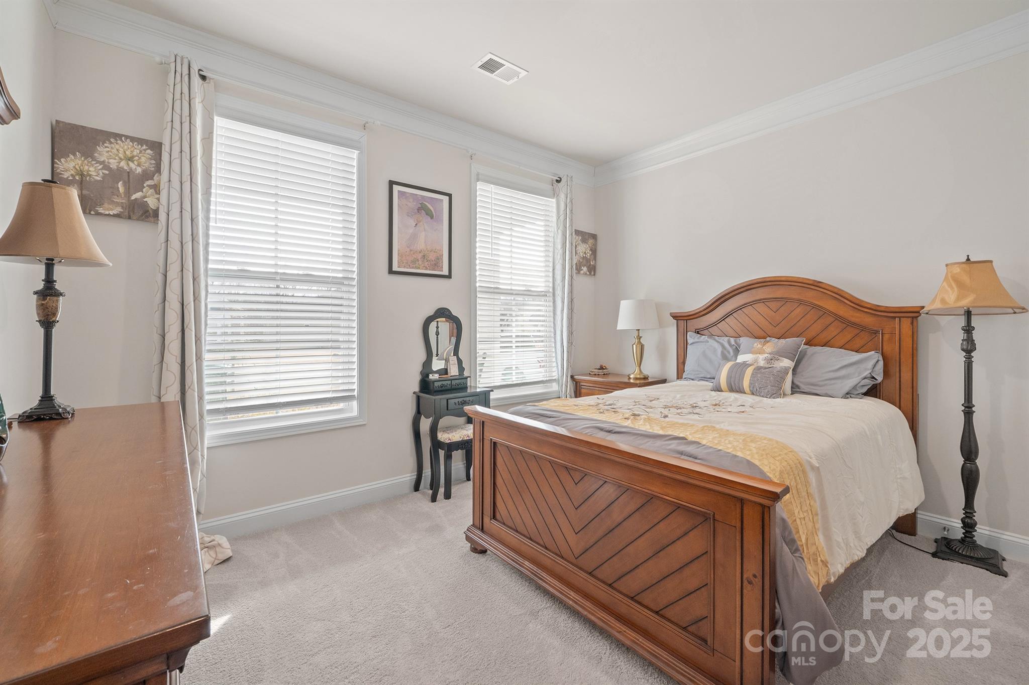 106 South Shayna Road Troutman, NC 28166 - Photo 23 of 41 a bedroom with a bed and a window