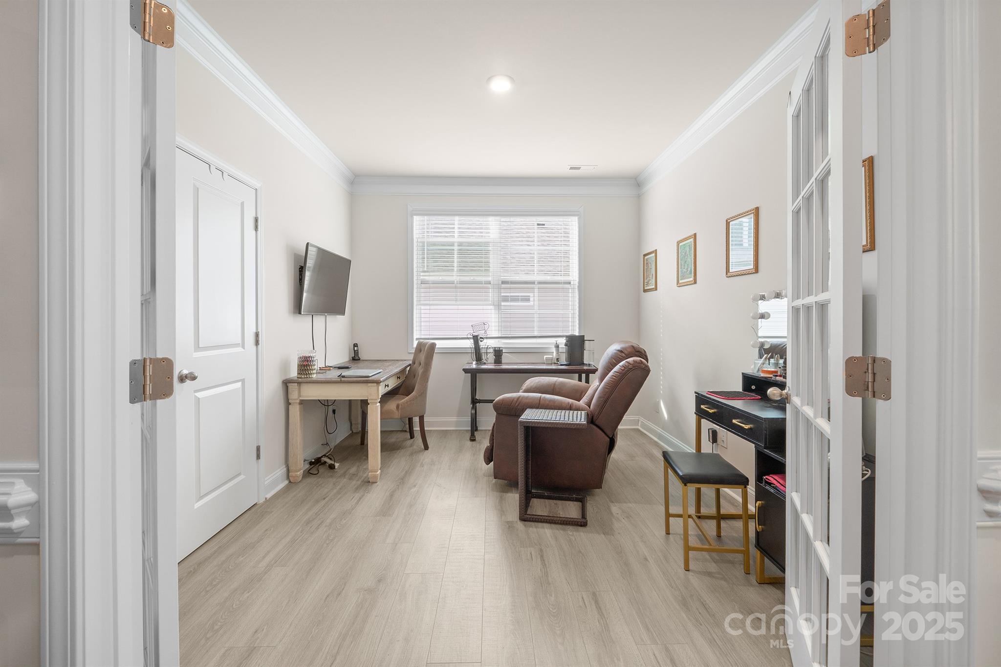 106 South Shayna Road Troutman, NC 28166 - Photo 26 of 41 a view of a livingroom with workspace and a window
