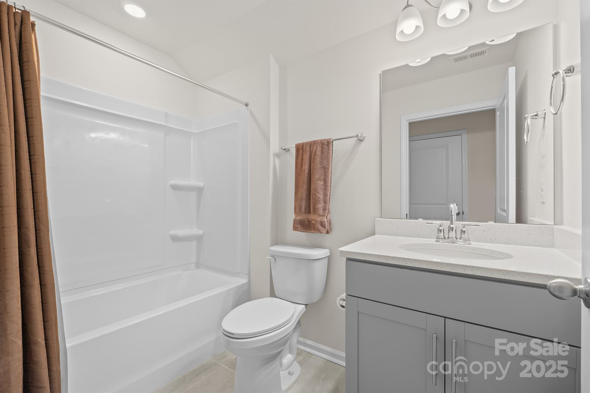 106 South Shayna Road Troutman, NC 28166 - Photo 34 of 41 a bathroom with a sink toilet and shower