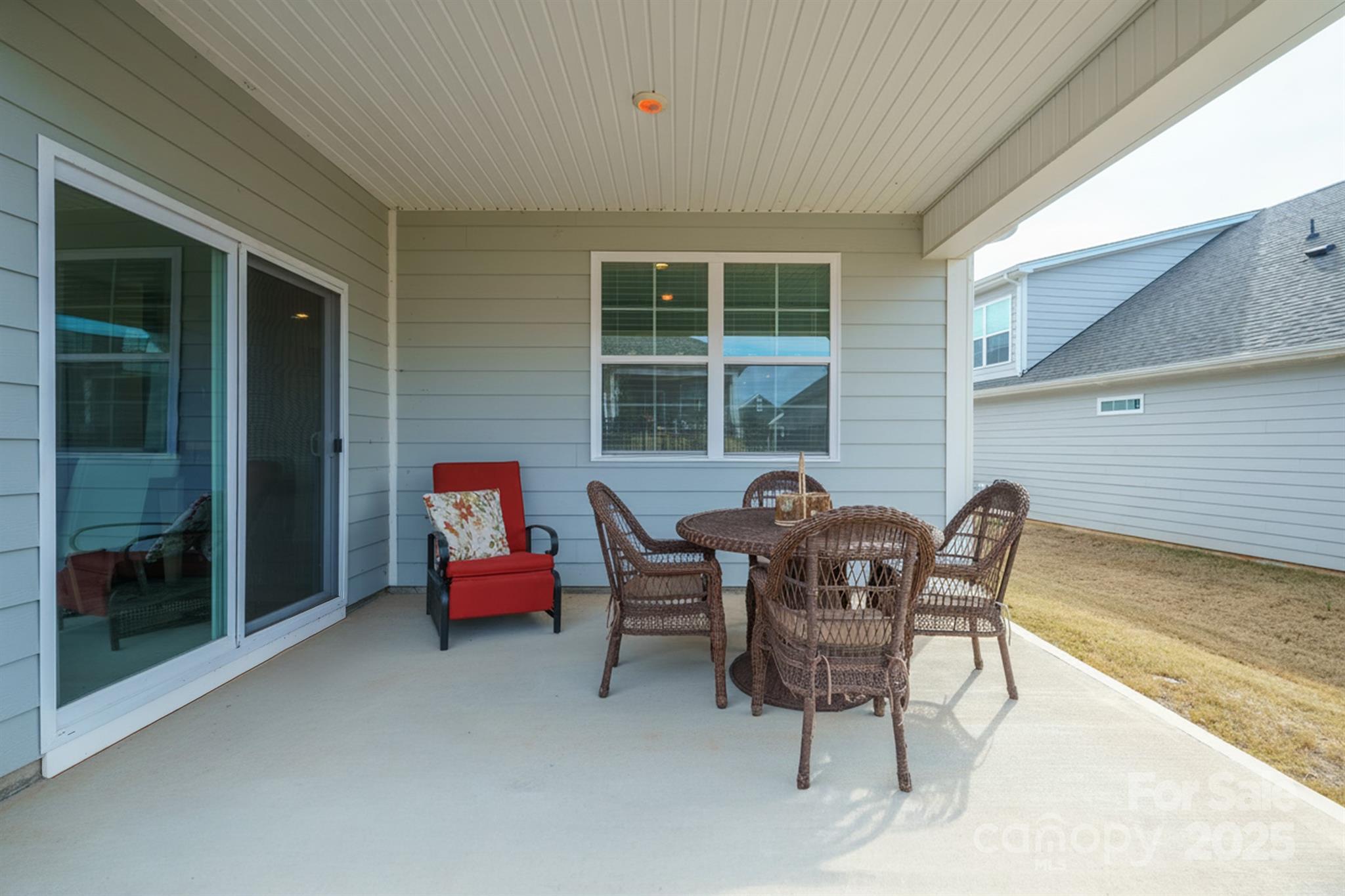 106 South Shayna Road Troutman, NC 28166 - Photo 38 of 41 a backyard of a house with outdoor seating
