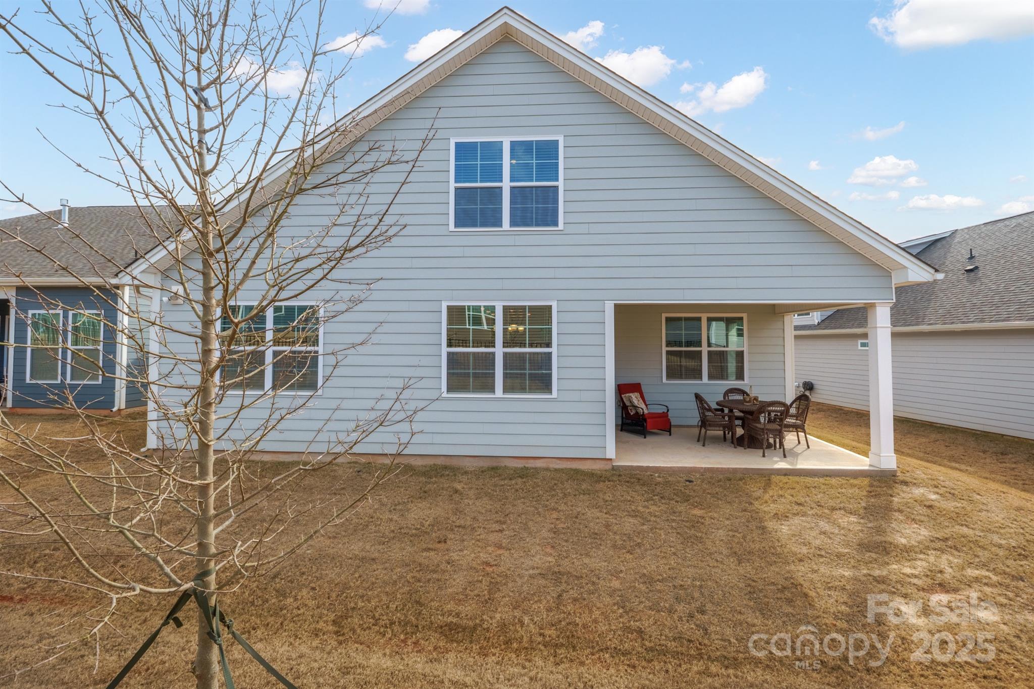 106 South Shayna Road Troutman, NC 28166 - Photo 39 of 41 a view of house with backyard space and seating space